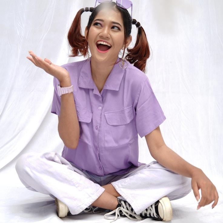 Kaveri Mehta, Lead Design Curator at Cloud Commons Island, reviewing corporate floral arrangements